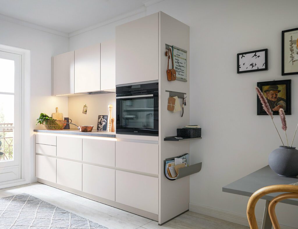 Schuller Light Matt Compact Handleless Kitchen | Sia Kitchens, Hertfordshire